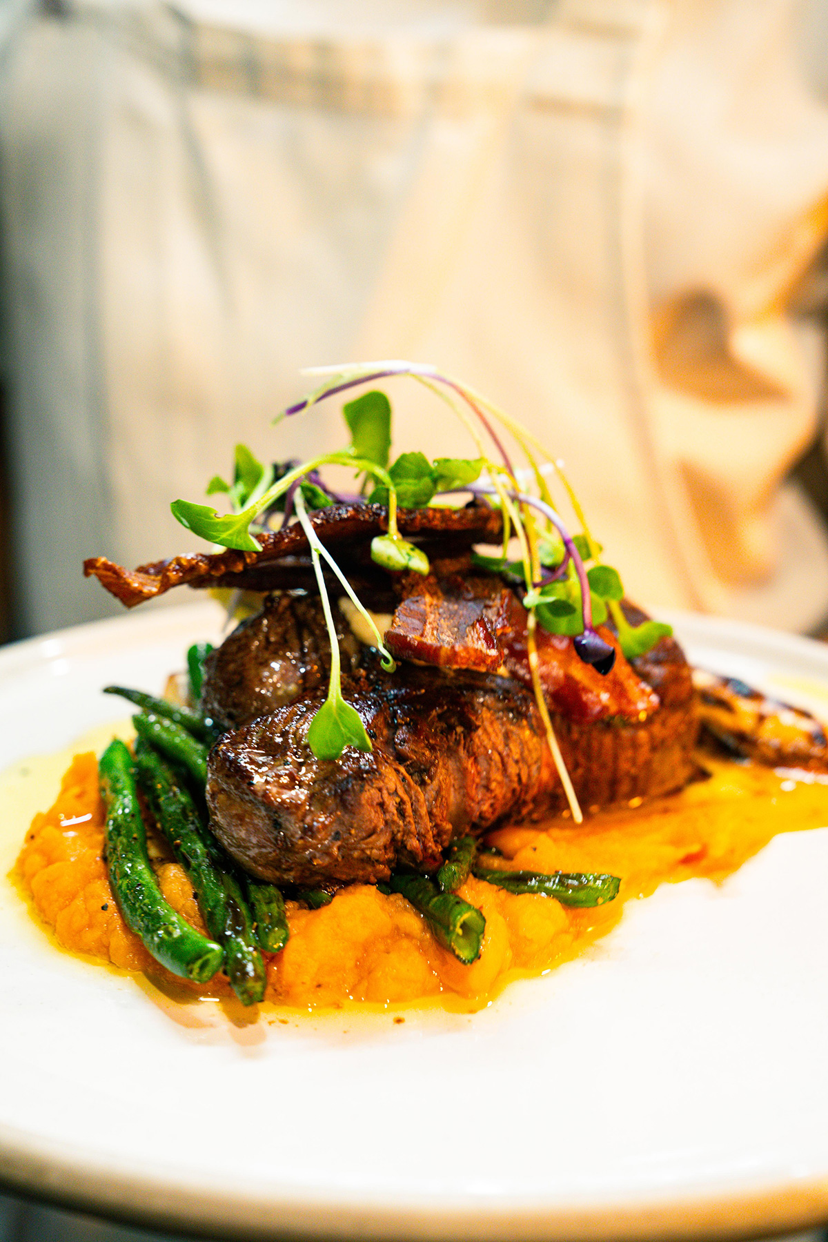 Plated main dish served at Goat House