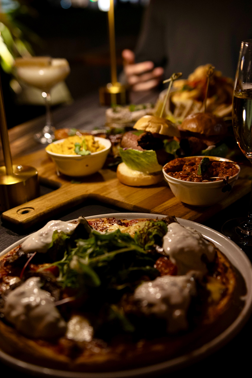 Table filled with food ready to share at Goat House